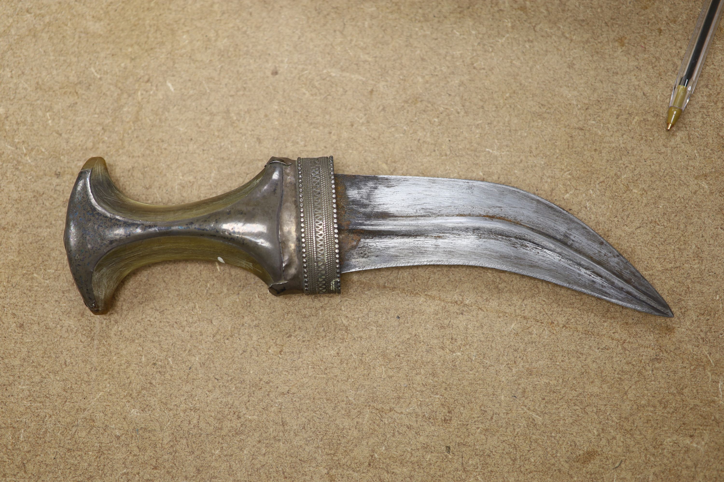 An Arab white metal Jambiya and a group of mainly Arab white metal items